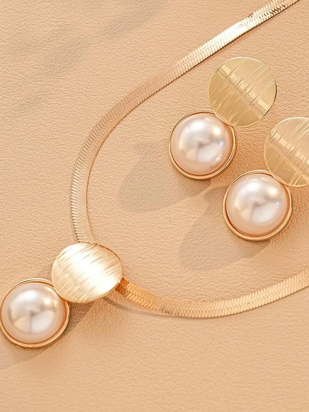 Anthropologie gold tone